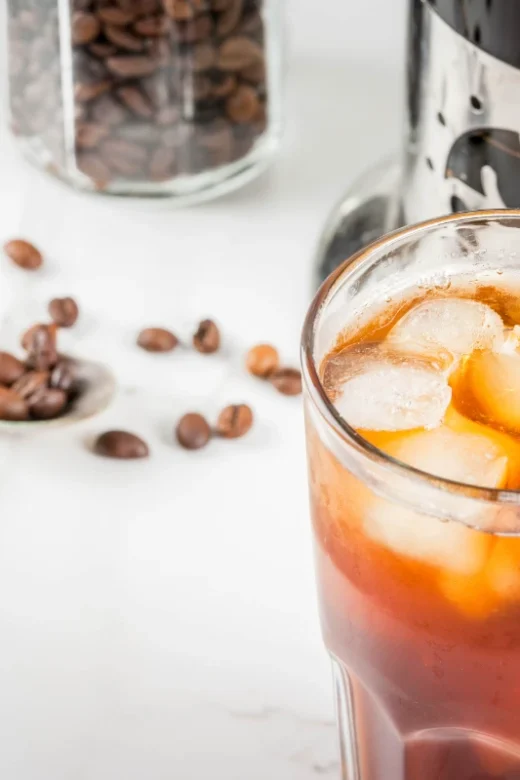 A cold brew coffee in a glass with ice